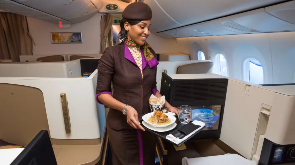 These Airlines Don't Serve Alcohol - Here's Why 3 Flight attendants preparing cabin service