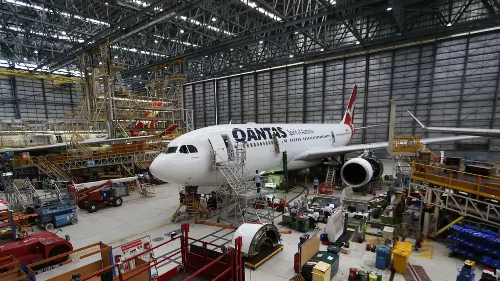 How Much Do Qantas Aircraft Maintenance Engineers & Technicians Earn in 2026? 2 Aircraft maintenance technician performing engine inspection